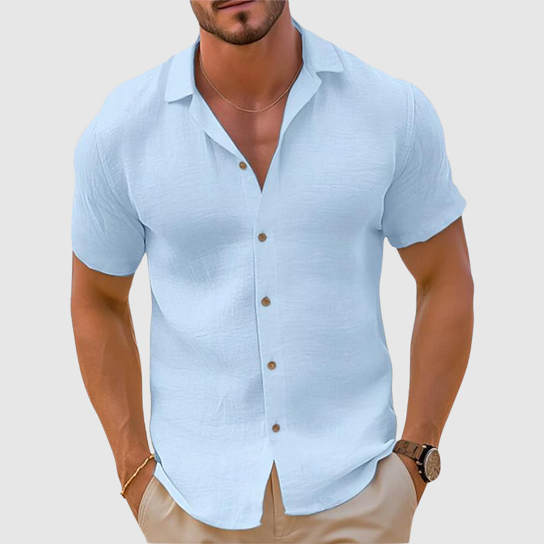 Stylish men's linen short sleeve shirt with button-up front, a comfortable summer fashion staple.