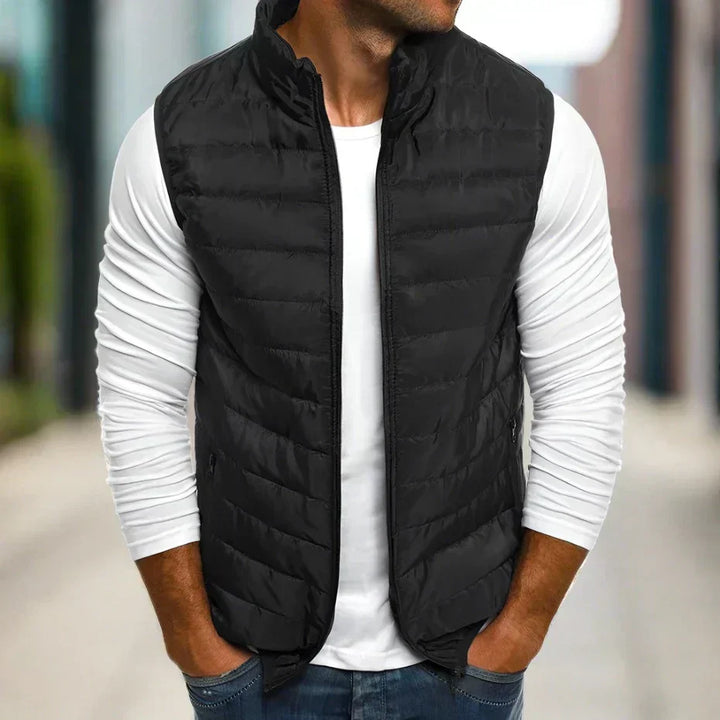 Comfortable men's gilet, a lightweight padded vest perfect for layering and adding warmth to any look.