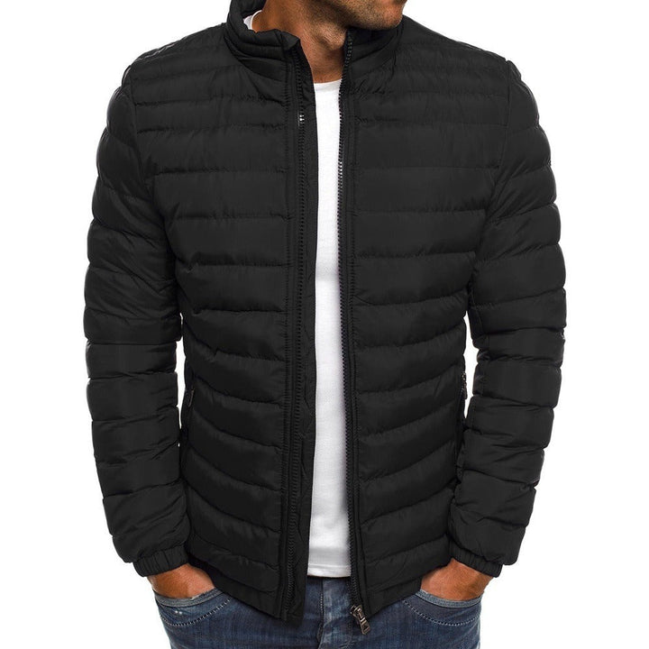 Men's lightweight slim-fit puffer jacket, ideal for winter warmth. Durable casual outerwear with zip pockets.
