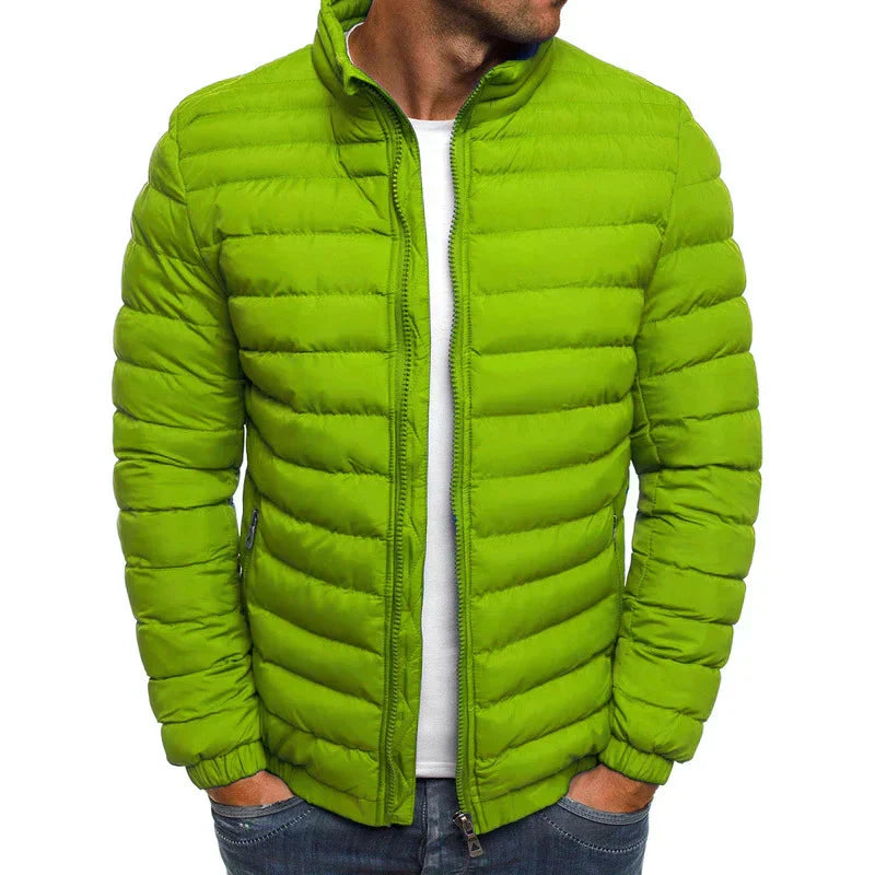 Comfortable men's slim-fit puffer jacket, lightweight and warm, perfect for winter casual wear. Durable outerwear.