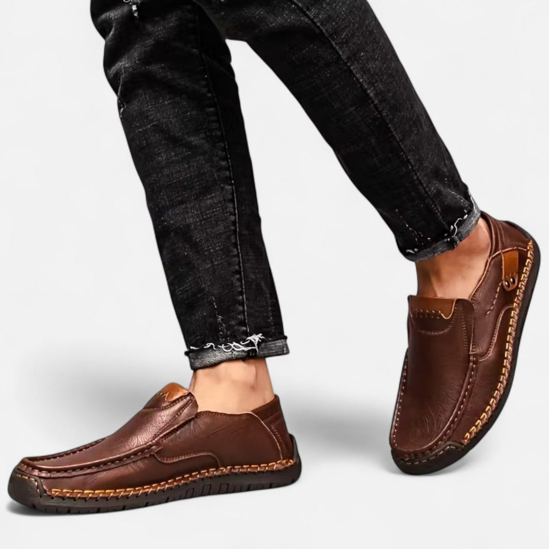 Coffee colored men's slip-on loafers, lightweight & comfortable for casual, modern style.