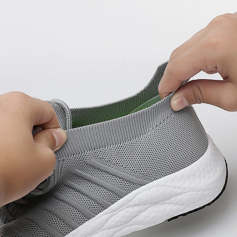 Modern men's sport sneakers, offering lightweight performance and a sleek design for contemporary fashion.