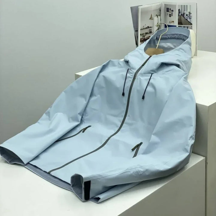 Front view of a men's waterproof windbreaker jacket, ideal for outdoor activities and lightweight comfort.