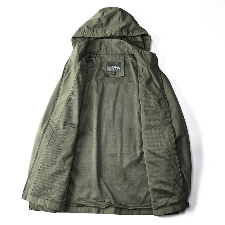 Close-up of the fabric texture of a men's lightweight waterproof windbreaker jacket.