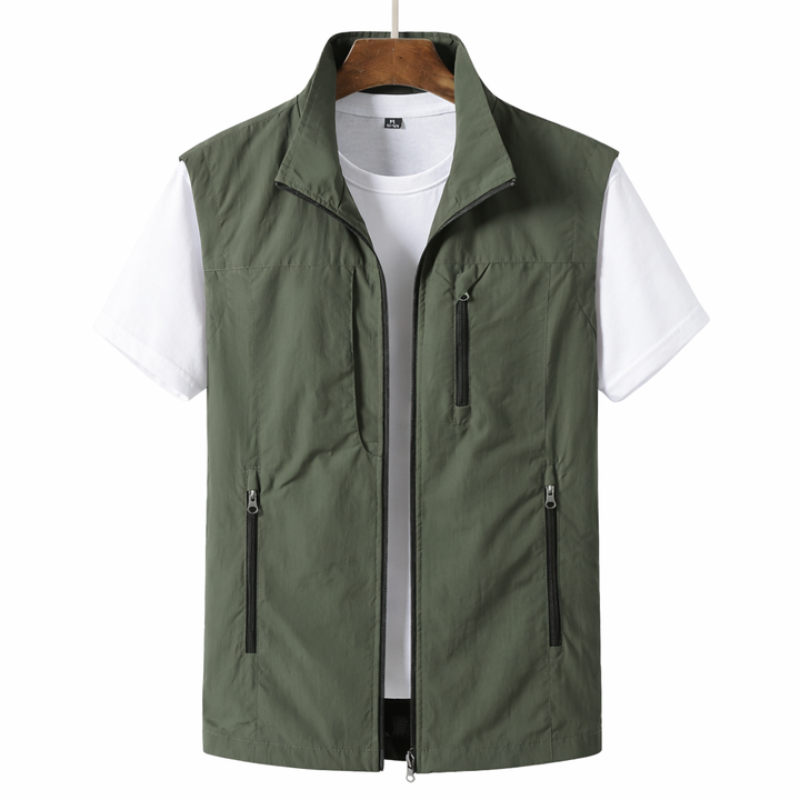 Men's lightweight zip front utility vest in a casual style for layering. Perfect for everyday wear.