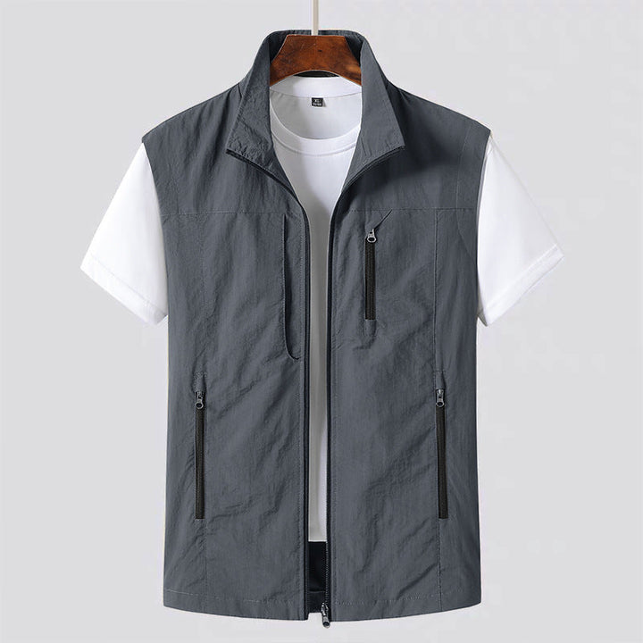 Stylish men's gilet, a lightweight sleeveless utility vest, ideal for casual layering & mens fashion outerwear.