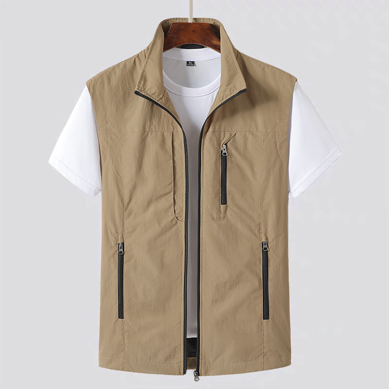 Close-up of a men's lightweight zip vest, a versatile utility gilet perfect for casual layering & outdoor wear.