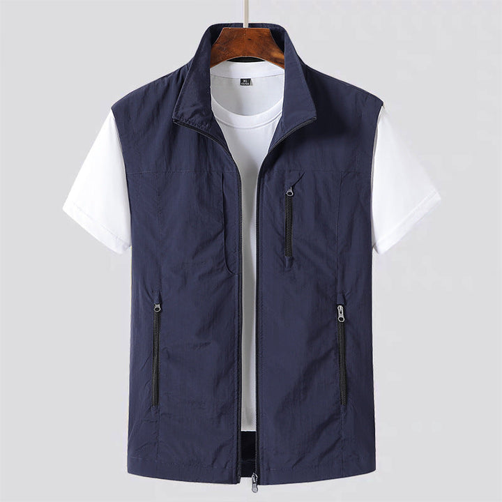 Full view of a modern men's lightweight utility gilet. A practical zip vest for everyday casual layering.