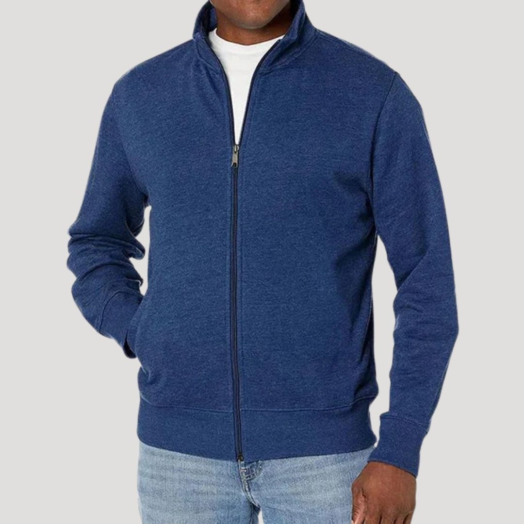 Side profile of a man wearing a stylish lightweight zip-up spring jacket, ideal for travel
