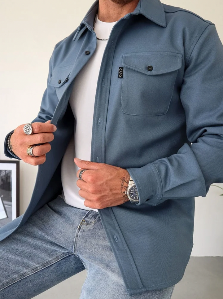 Men's long sleeve button-down shirt, casual cotton blend, front view with pockets