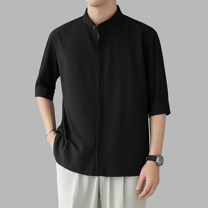 Versatile men's mandarin collar long-sleeve button-down shirt, ideal for casual summer style or smart spring outfits.