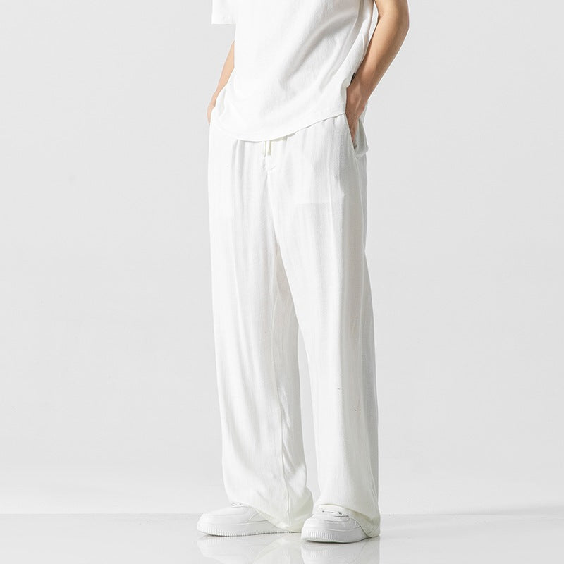Men's casual drawstring pants, offering a comfortable loose fit for versatile, everyday and relaxed style wear.