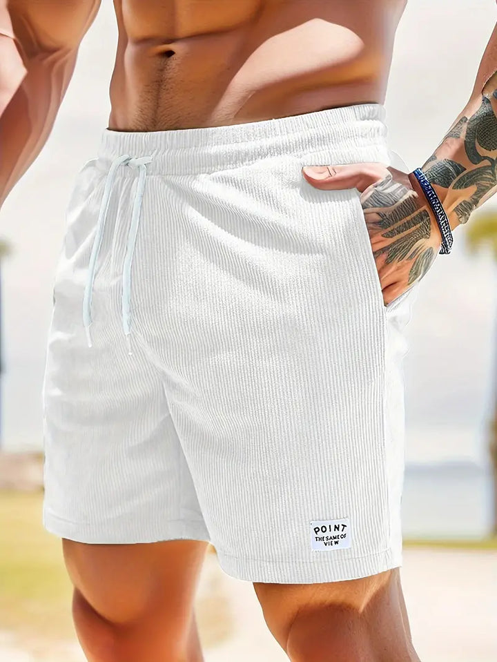 Men's simple loose-fit shorts with a practical drawstring waist for convenience.