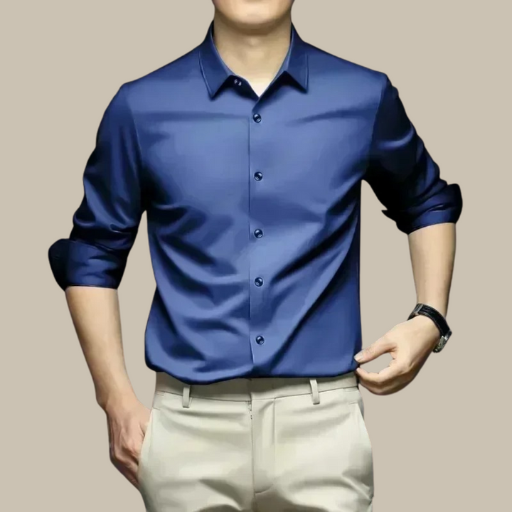 Model wearing a men's luxurious casual shirt. Long-sleeve button-down, stylish fit for effortless comfort.