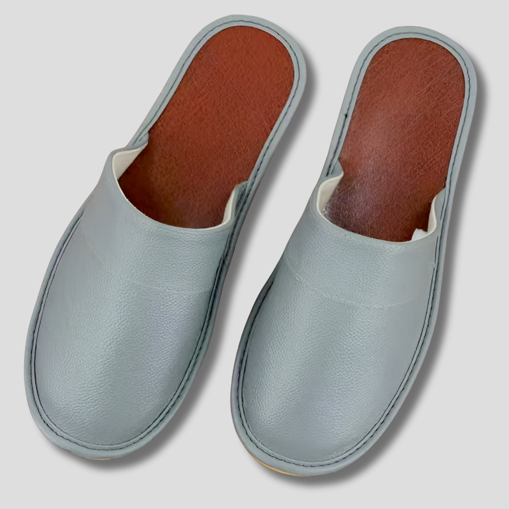 Pair of men's comfort leather house shoes, ideal for casual wear and indoor lounging