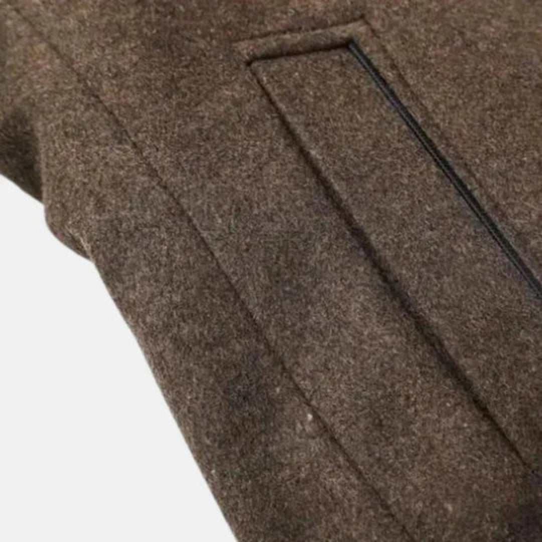 Warm & comfortable navy blue men's overcoat. Mid-length with a stand collar and elegant button-front design.