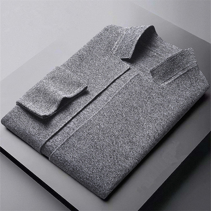 Textured knit men's cardigan with functional button front, a versatile and comfortable top for all seasons.