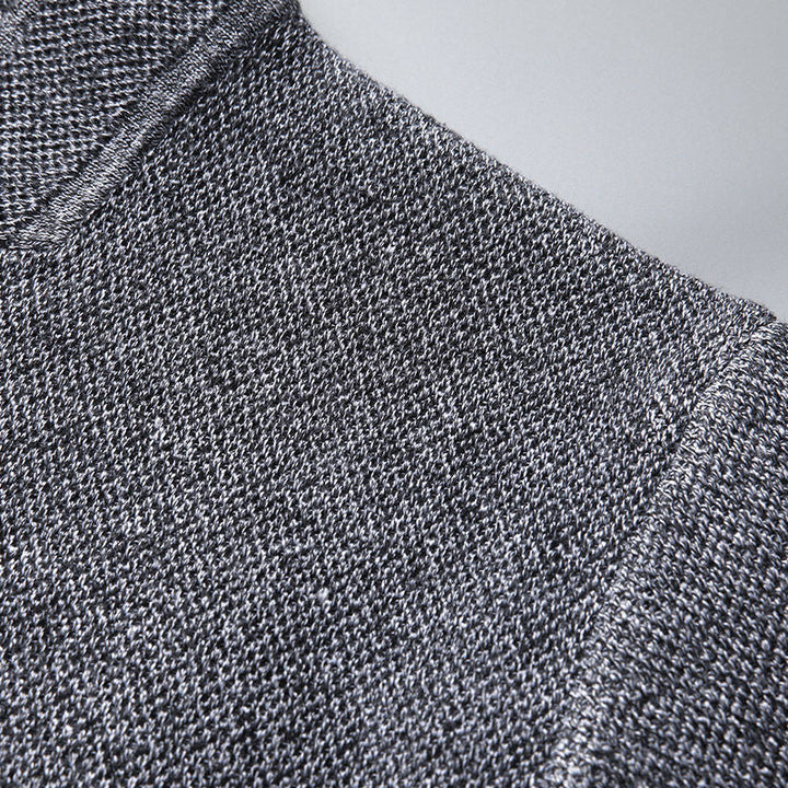 Minimalist men's textured knit cardigan, button-front design, ideal for versatile smart casual layering.