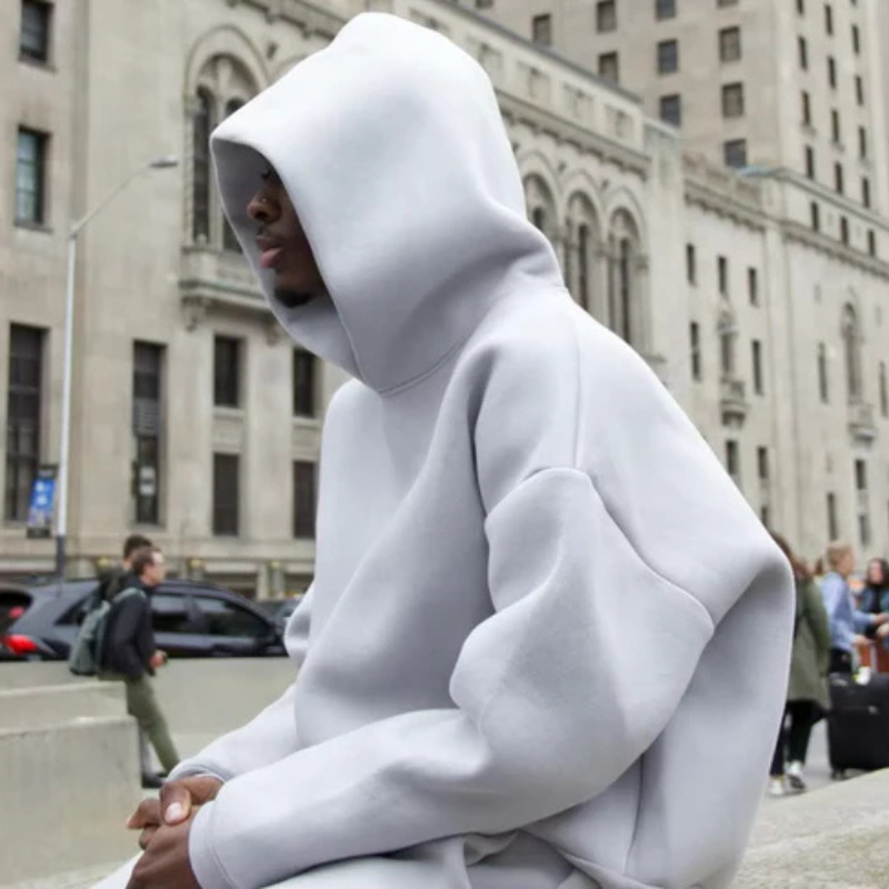 Comfortable men's lounge wear, a minimalist hooded sweater set in neutral tone