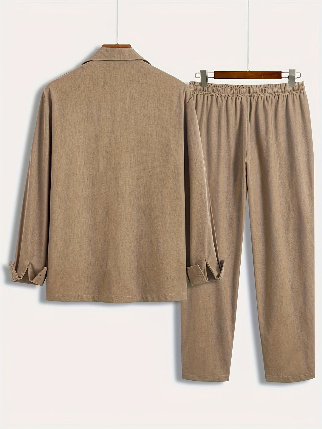 Man wearing a relaxed fit men's linen blend two-piece set, exuding effortless minimalist style.