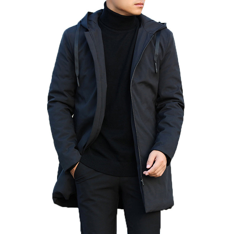 Chic men's winter coat featuring a hood, suitable for urban environments and warmth.