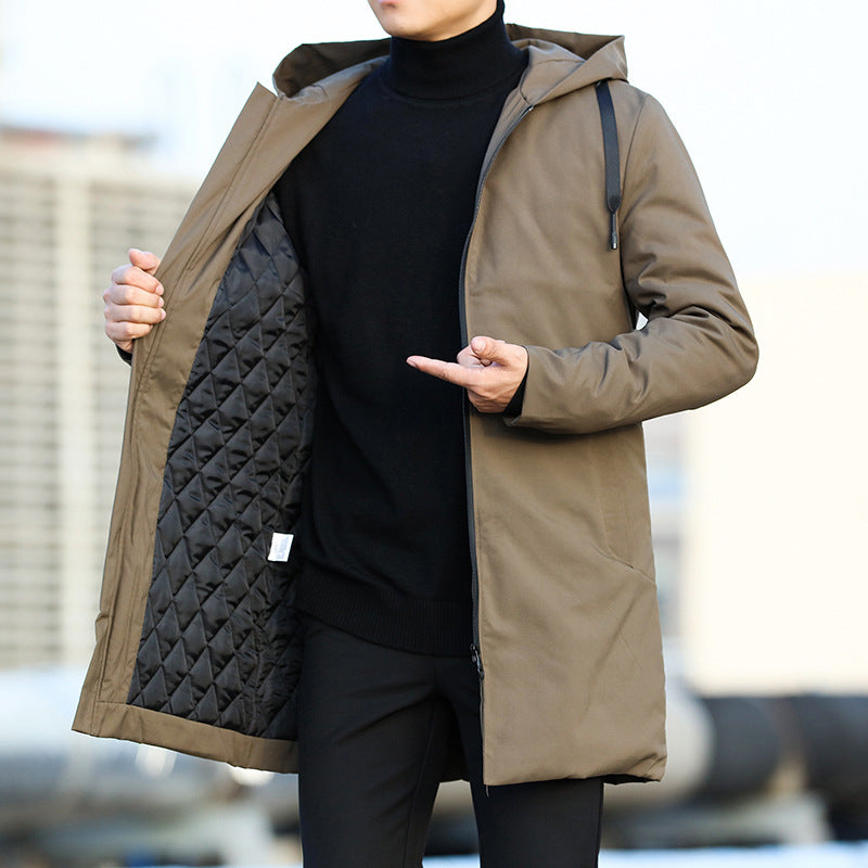 Close-up of a men's hooded winter jacket, highlighting its warm and modern design.