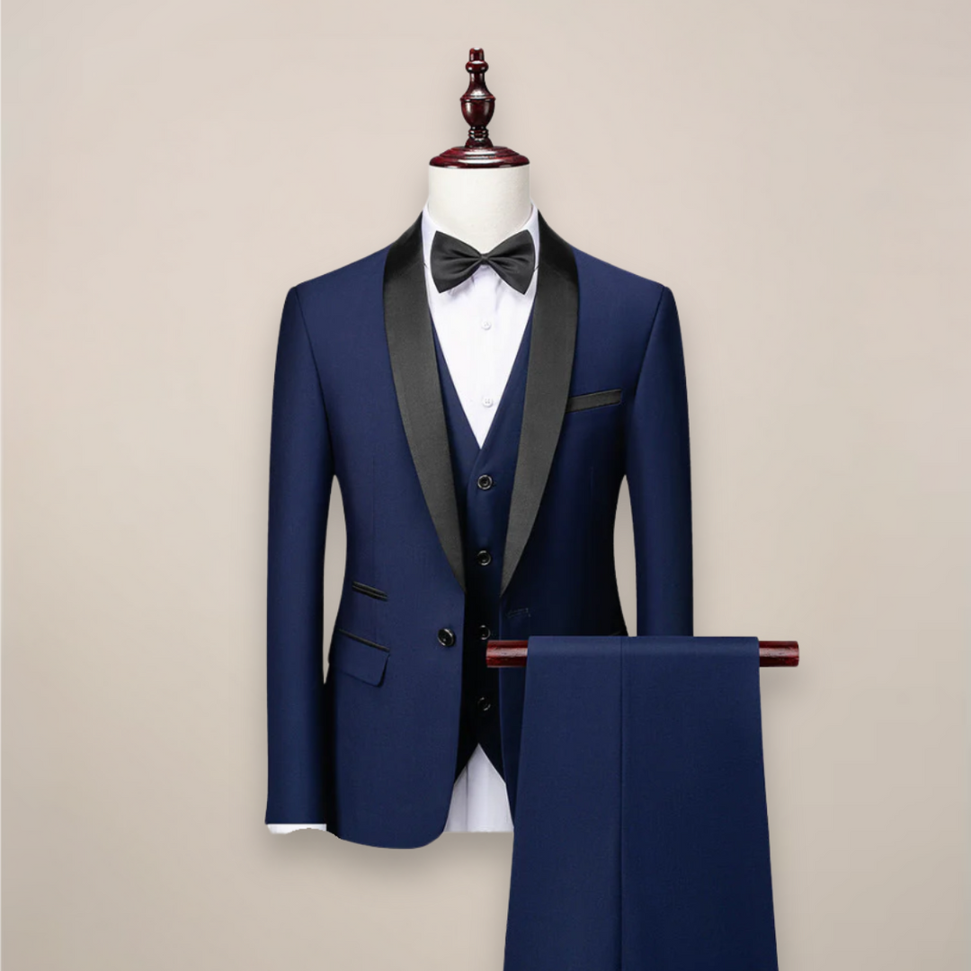 Elegant men's formalwear: a black modern fit three-piece tuxedo suit with satin lapels