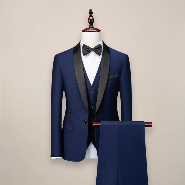 Elegant men's formalwear: a black modern fit three-piece tuxedo suit with satin lapels