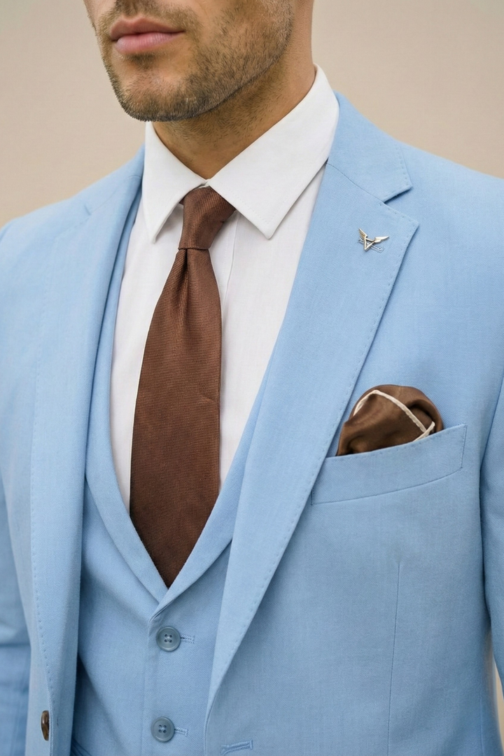 Menswear model showcasing a sleek Slim Fit Business Suit, complete with waistcoat and trousers.