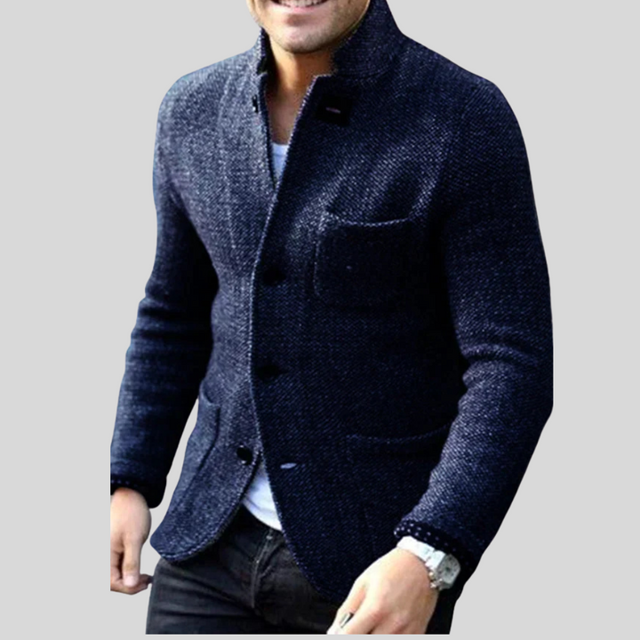 Stylish men's insulated blazer, perfect for business casual or versatile fall fashion. A warm, modern jacket.