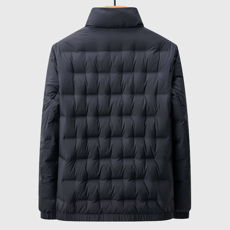 Padded men's quilted jacket, featuring a stand collar for extra warmth. Comfortable and lightweight winter coat.