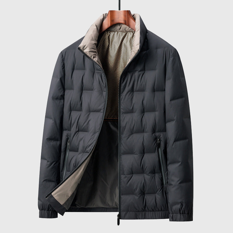 Stylish mens quilted jacket with a sharp stand collar. This casual, padded outerwear is a modern winter coat essential.