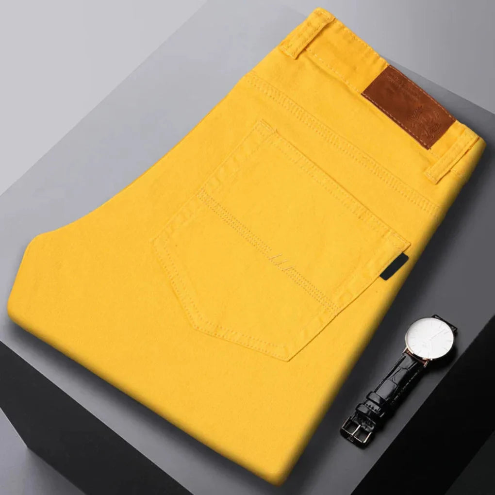 Men's modern slim-fit denim jeans in a dark wash, perfect for casual wear and everyday style.