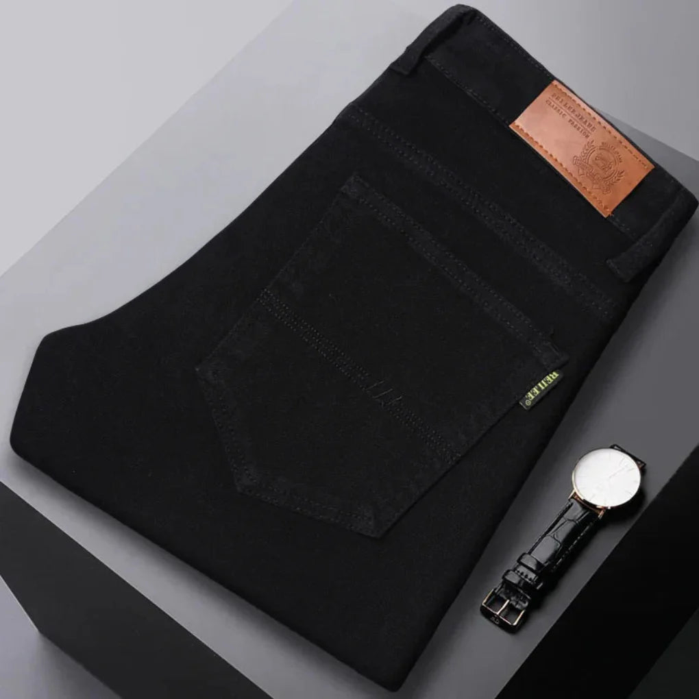 Modern slim-fit men's stretch jeans in a classic denim shade, a must-have for any wardrobe.