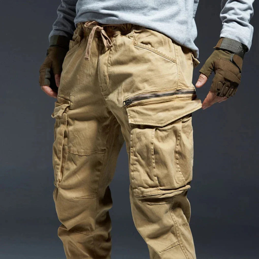 Men's multi-pocket cargo trousers in beige, offering comfort and utility for active lifestyles.