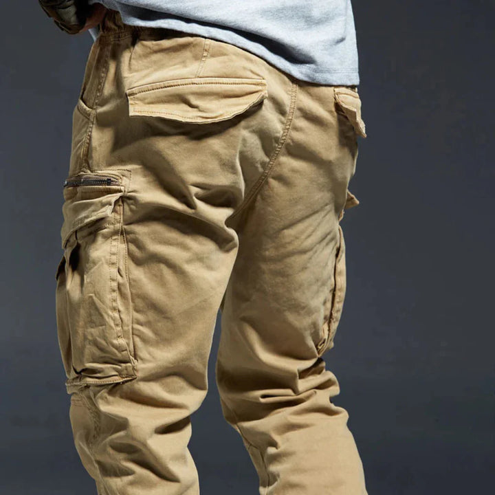 Comfortable men's cargo pants with multiple pockets, perfect for casual, travel, or outdoor activities.