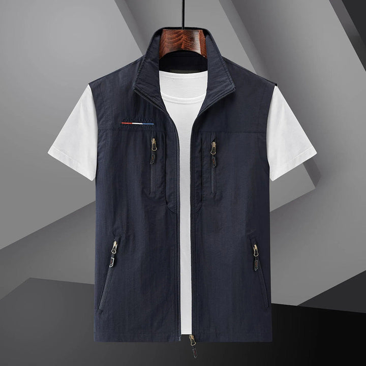Men's multi-pocket outdoor utility vest for summer, lightweight & breathable, regular fit.