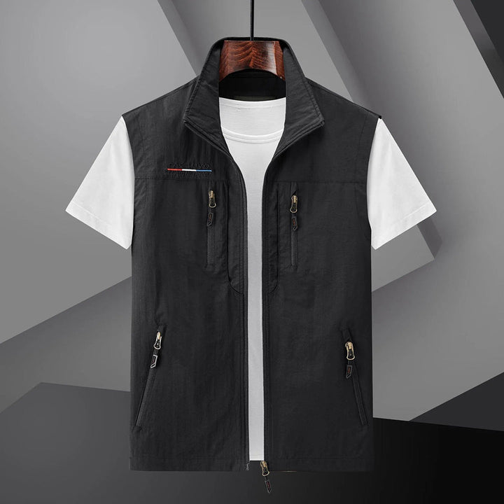 Durable men's fishing & travel utility vest, multi-pocket design, breathable summer gear.