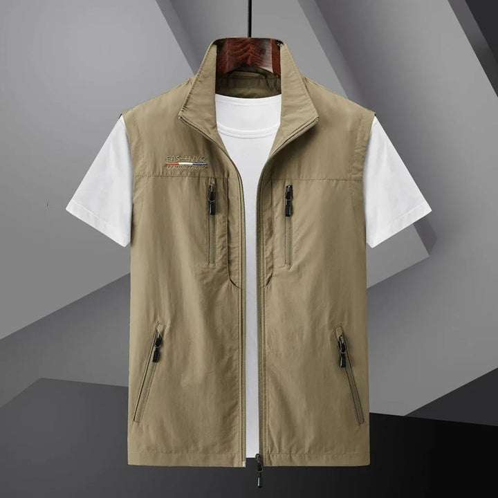 Men's outdoor hiking utility vest, multi-pocket, breathable & durable sleeveless jacket for summer.