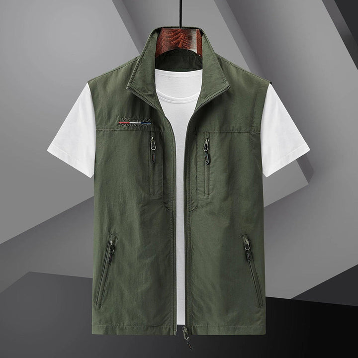 Versatile men's summer utility vest with multiple pockets, lightweight, breathable, ideal for fishing & travel.