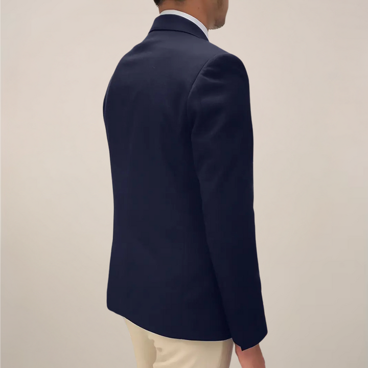 Men's navy blue tailored lightweight blazer jacket, perfect for smart casual spring fashion and business. Model wearing a navy blue tailored lightweight blazer, ideal for smart casual wear. Close-up of navy blue lightweight tailored blazer fabric, showcasing quality and suitable for smart casual, spring fashion.