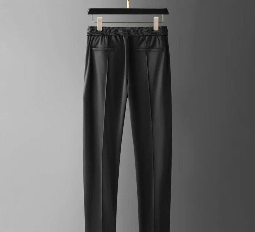 Casual men's outfit featuring a classic polo shirt and trendy tapered pants set