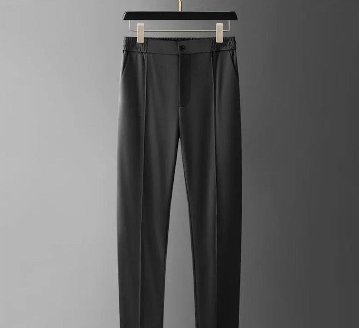 Summer-ready men's cotton blend polo shirt and tapered pants, perfect for relaxed style