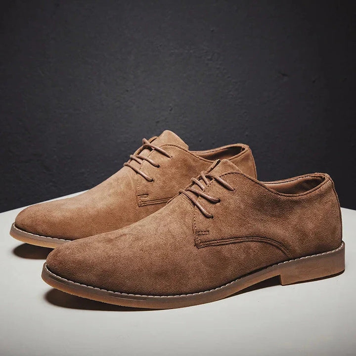 Stylish men's black suede oxford dress shoes, a versatile footwear choice