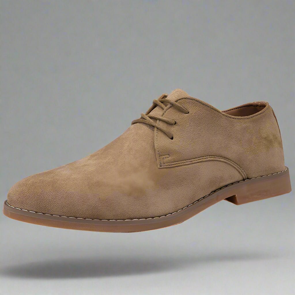 Top view of men's new suede oxford dress shoes, showcasing quality craftsmanship
