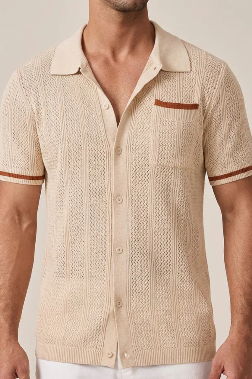 Breathable men's openwork knit shirt, short sleeve, camp collar, contrast trim. Relaxed summer fashion.