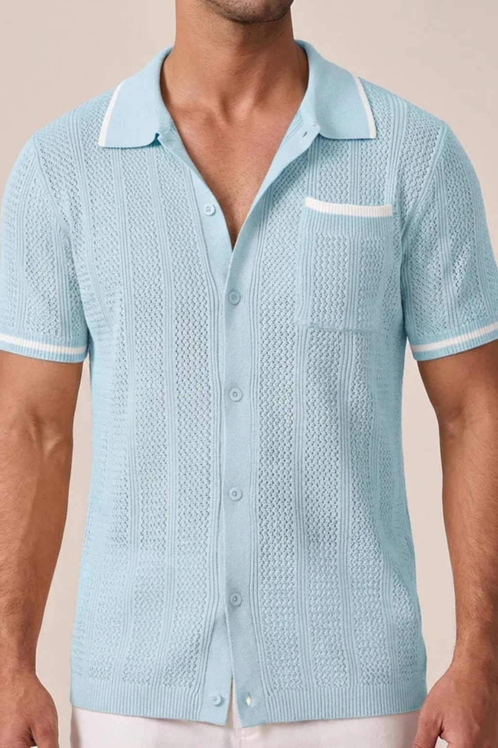 Men's stylish short sleeve openwork knit shirt featuring a camp collar and distinctive contrast trim.