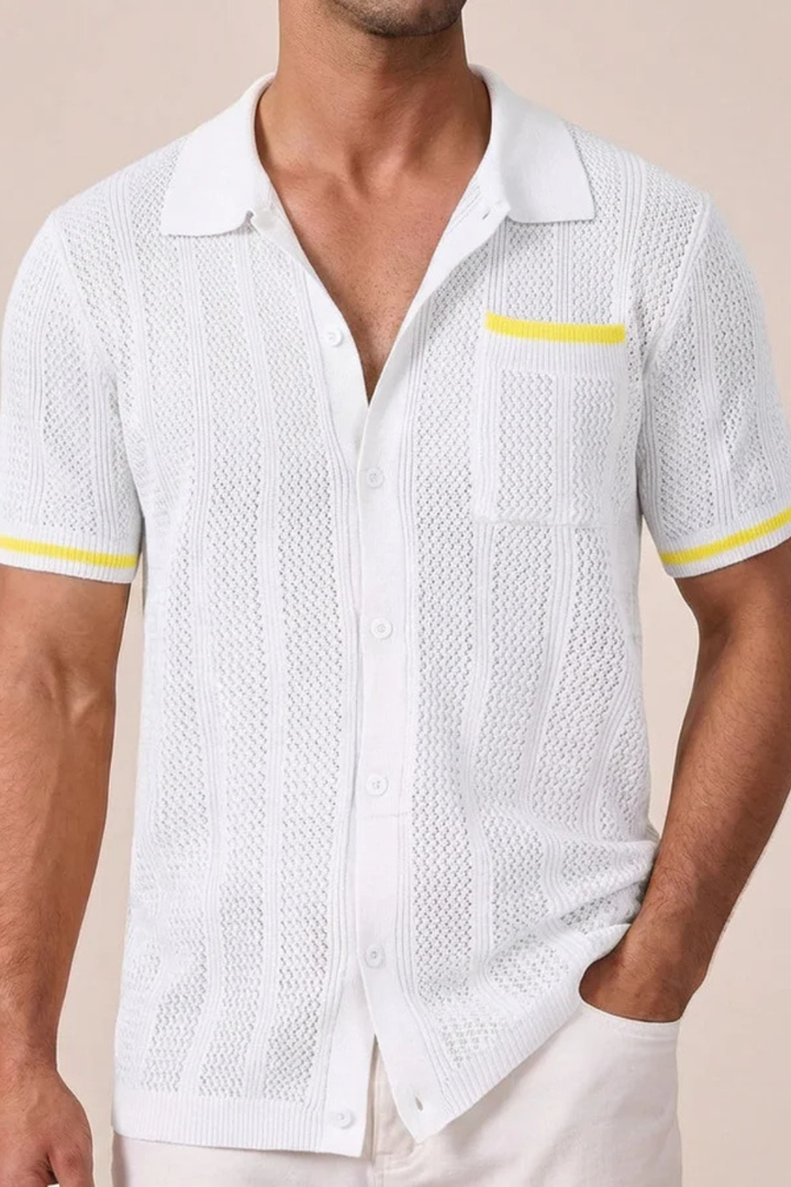 Front view of men's openwork knit short sleeve shirt with classic camp collar and contrast trim detail.