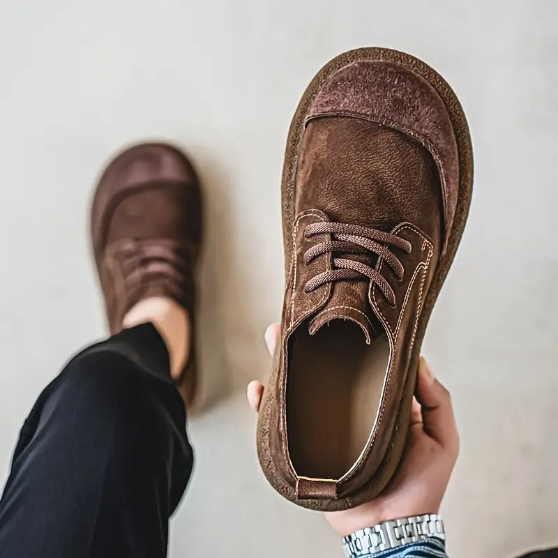 Stylish men's brown leather orthopedic footwear, ideal for casual and comfortable walking.