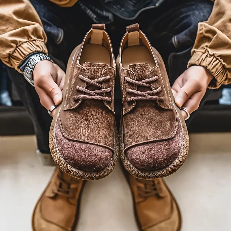 Pair of men's orthopedic leather comfort shoes in brown, perfect for supportive casual style.